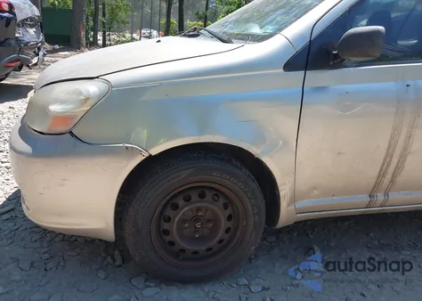 2003 Toyota Echo from USA, damaged, VIN JTDBT123230261051